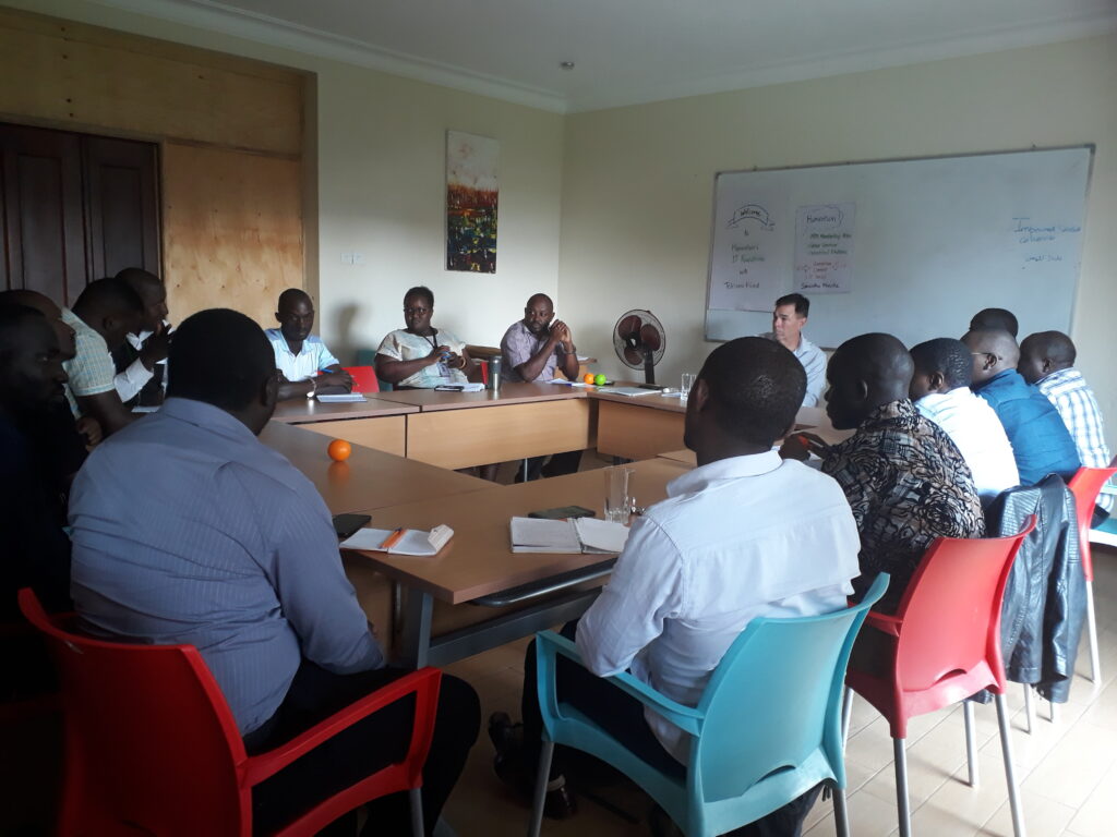 Attendees in Uganda at a roundtable